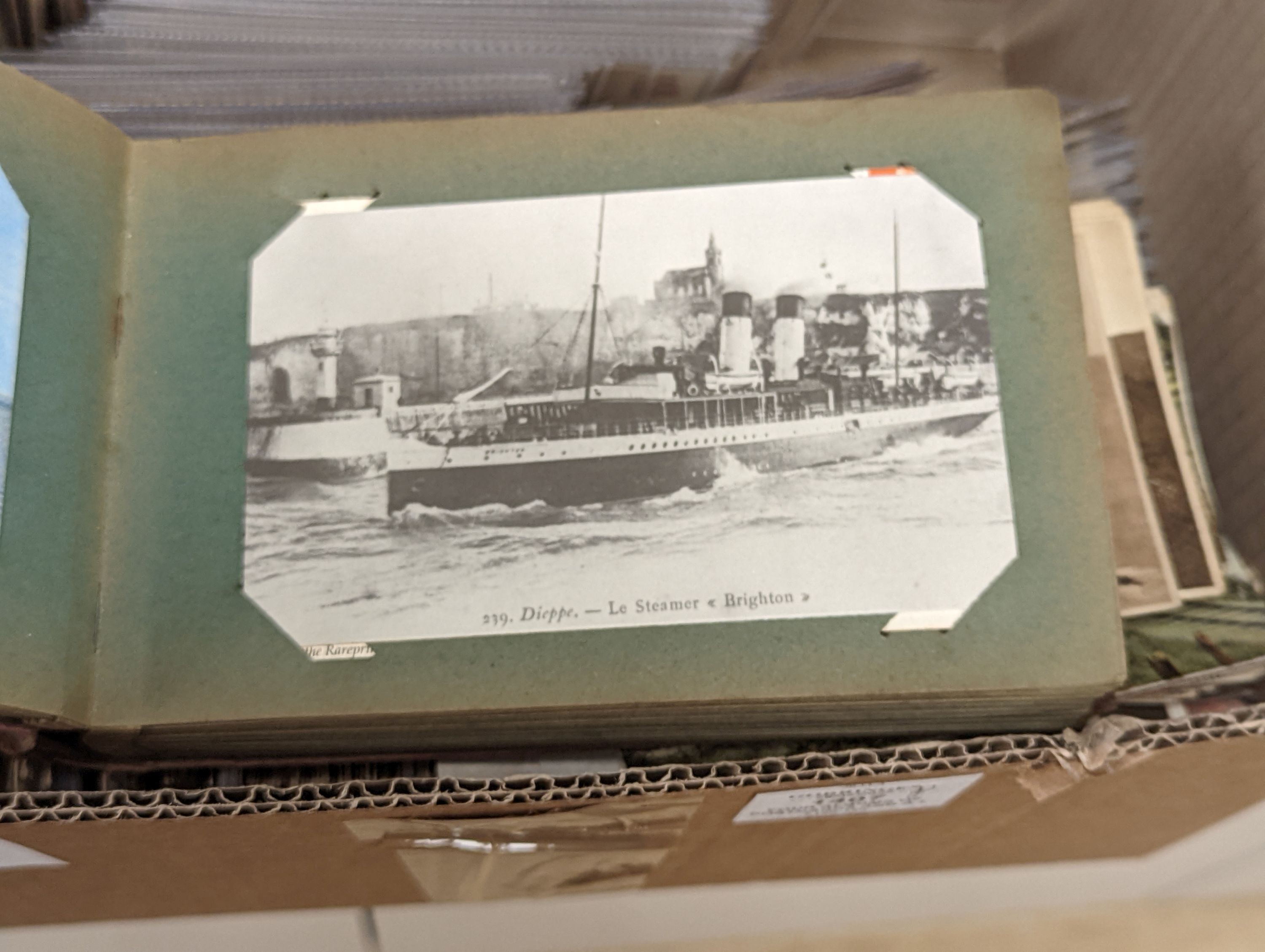 Four albums of postcards and a large collection of loose postcards, mainly British topographical, Victorian cabinet photographs, etc.